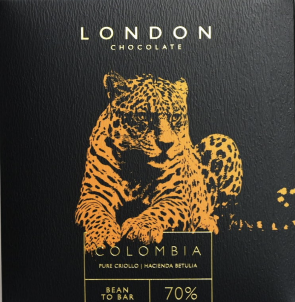 Front packaging of London Chocolate 70% Colombia with black background and a tiger in orange in the foreground